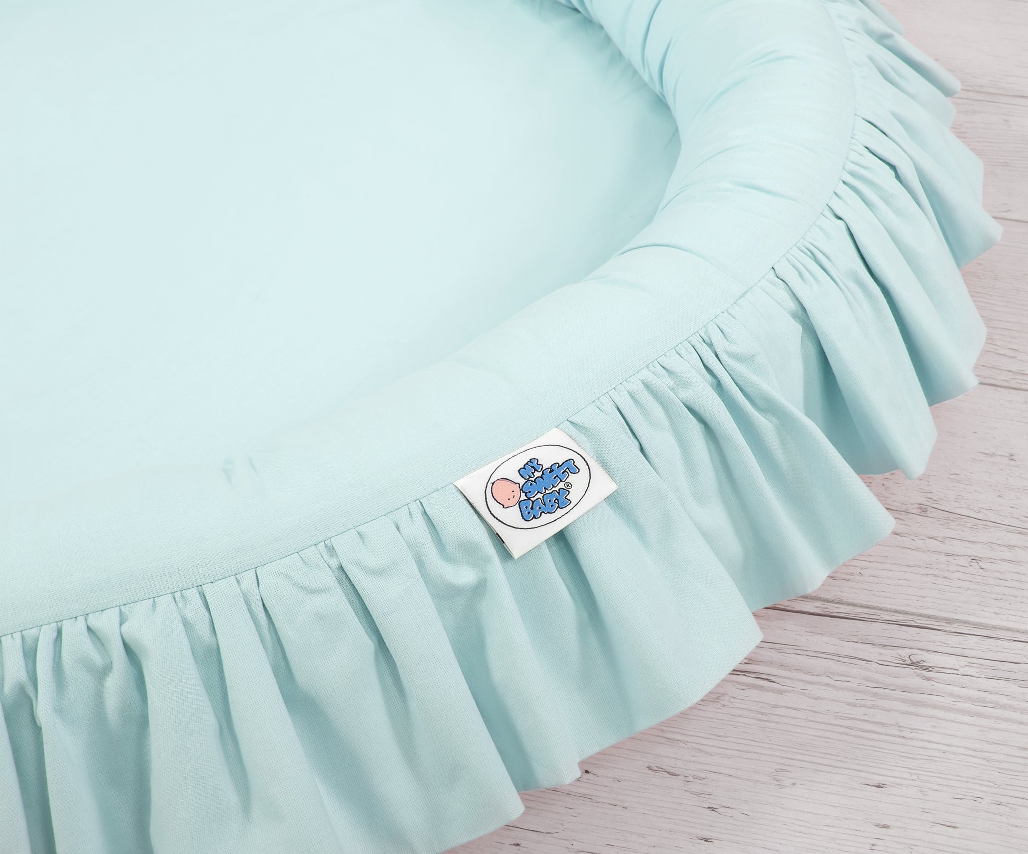 Nest with flounce - mint