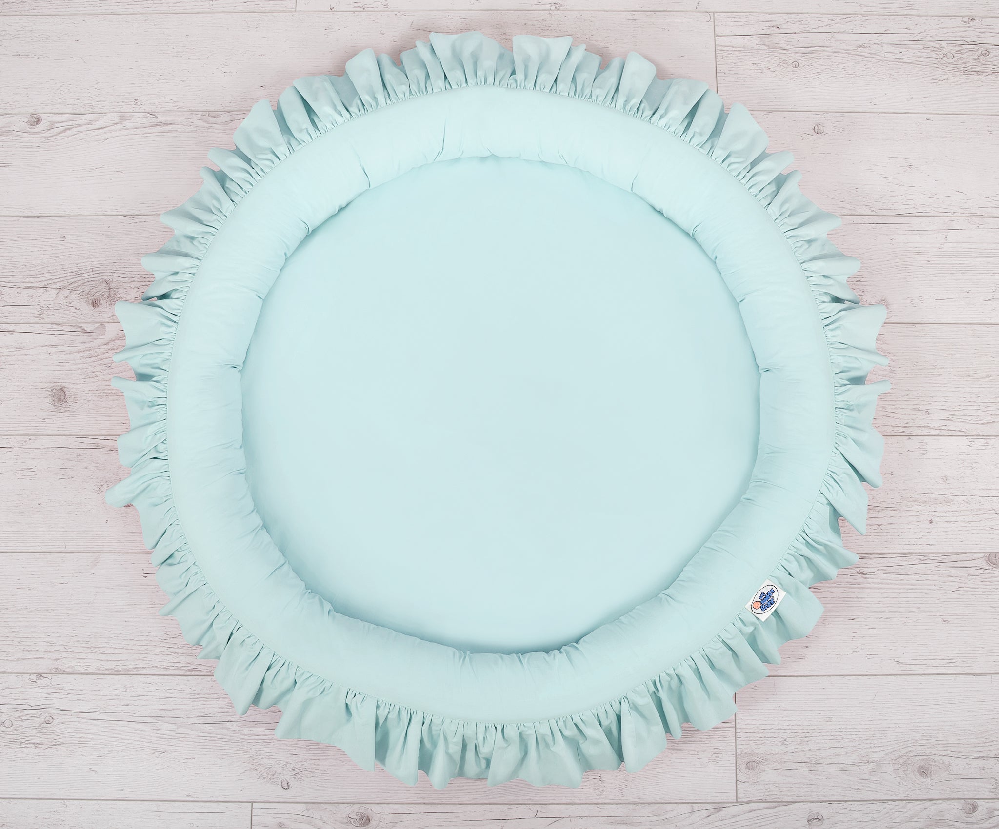Nest with flounce - mint