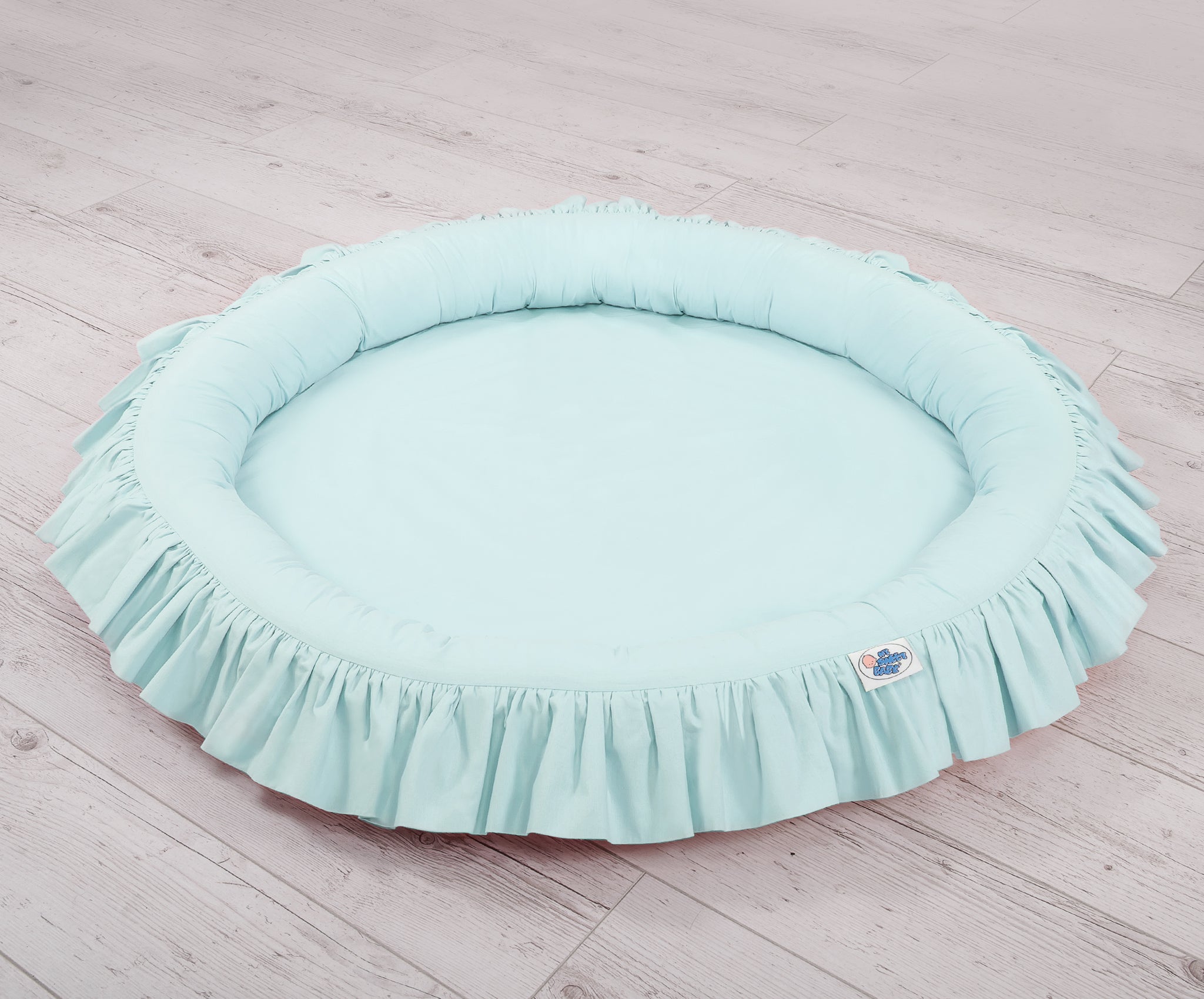 Nest with flounce - mint