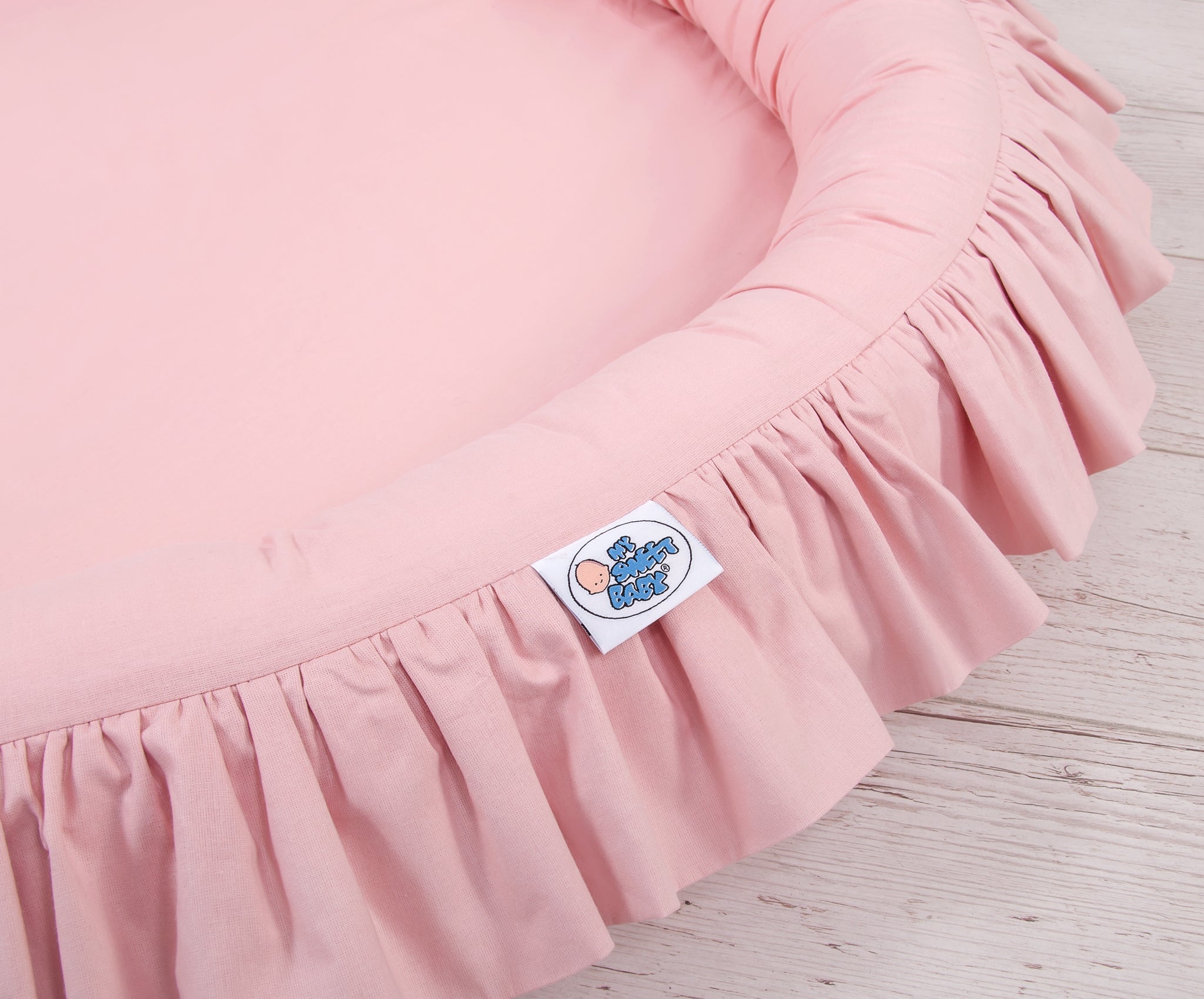 Nest with flounce - pastel pink