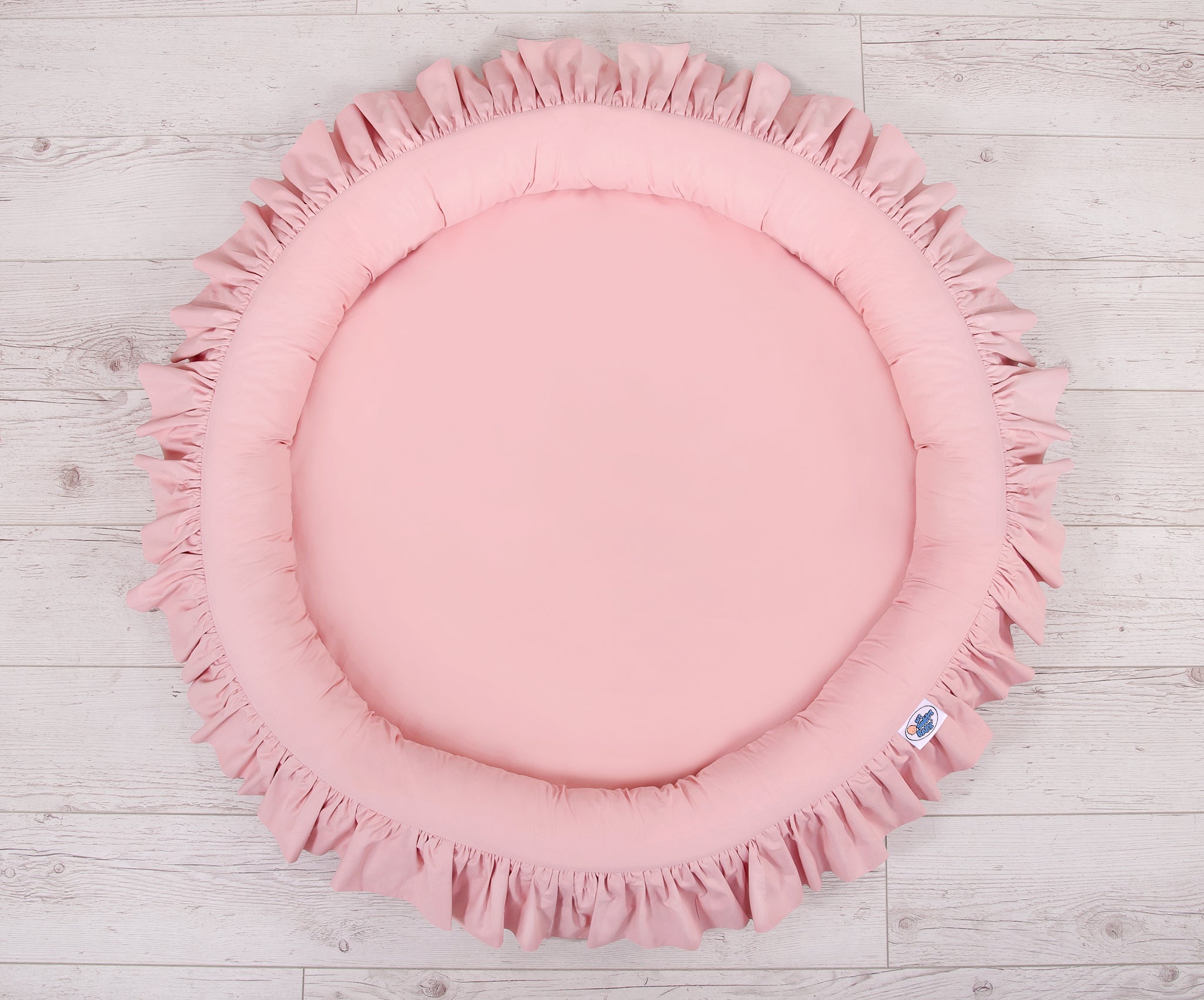 Nest with flounce - pastel pink