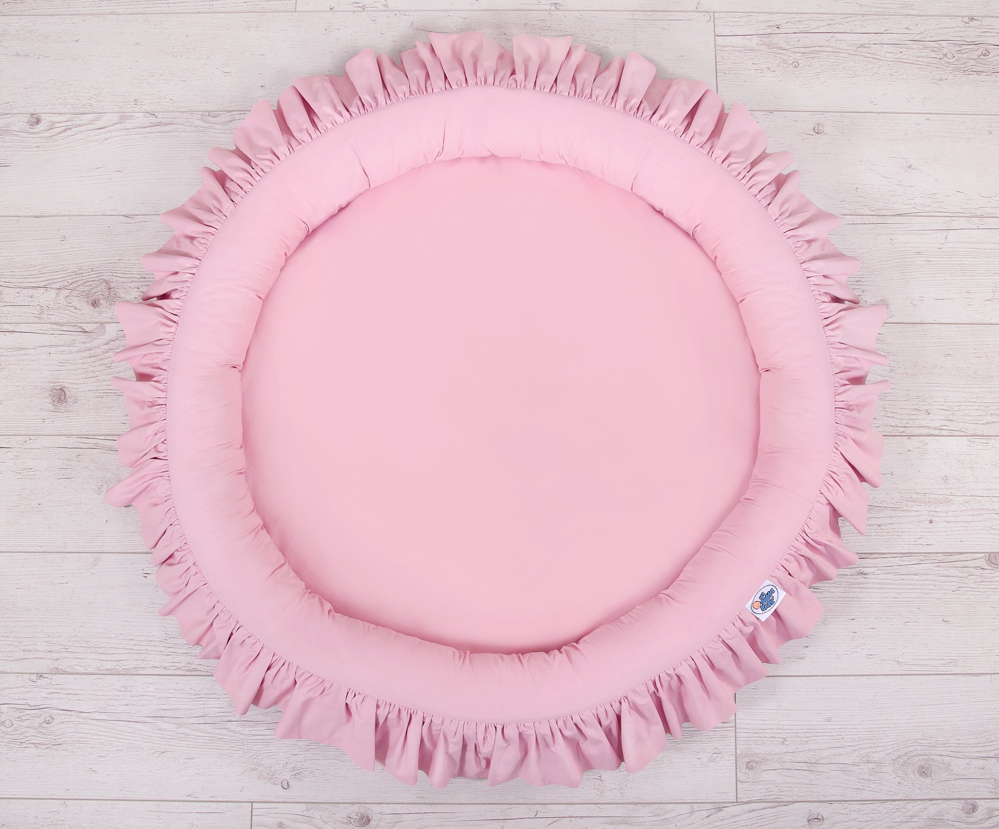 Nest with flounce - pink
