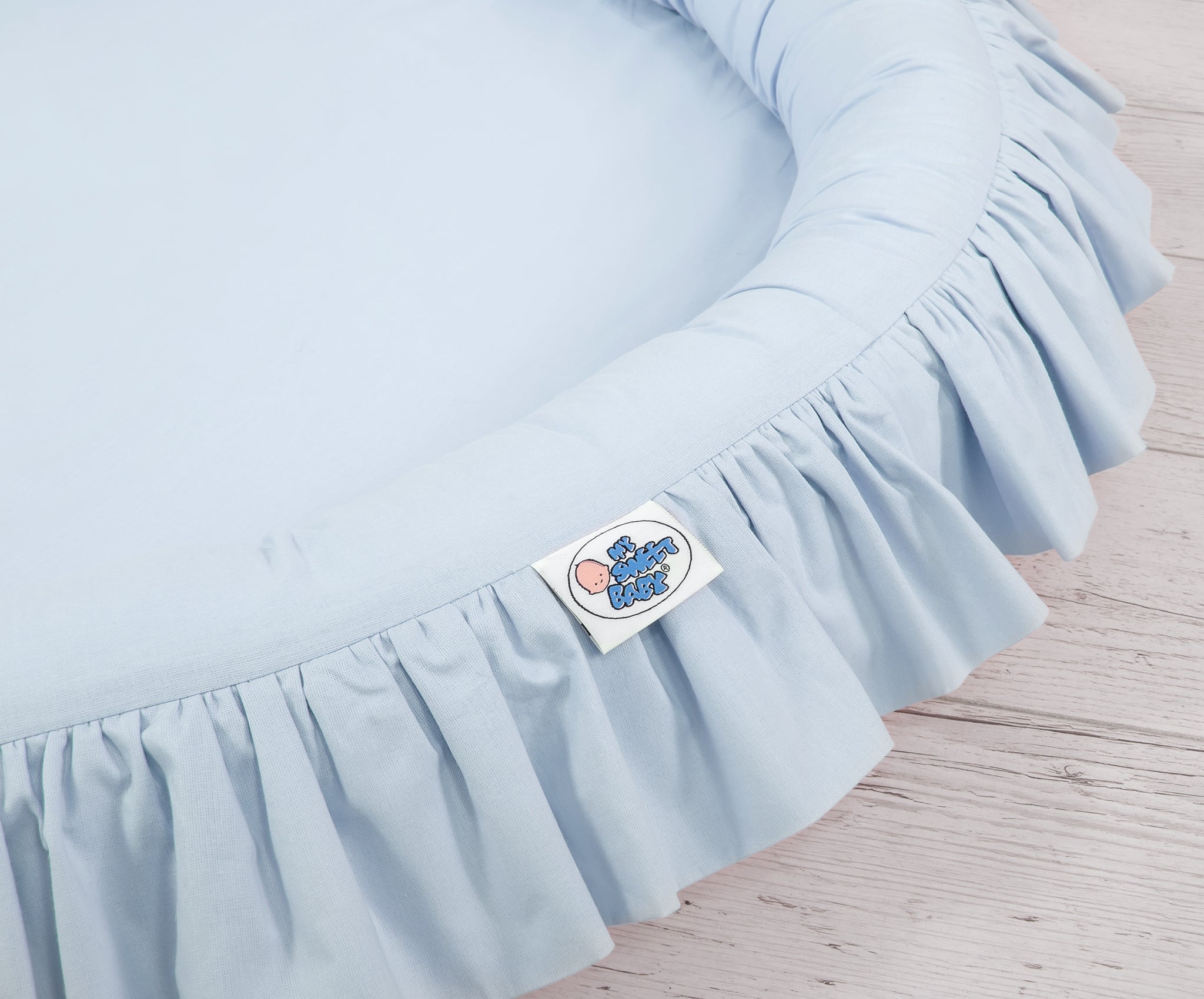 Nest with flounce - blue
