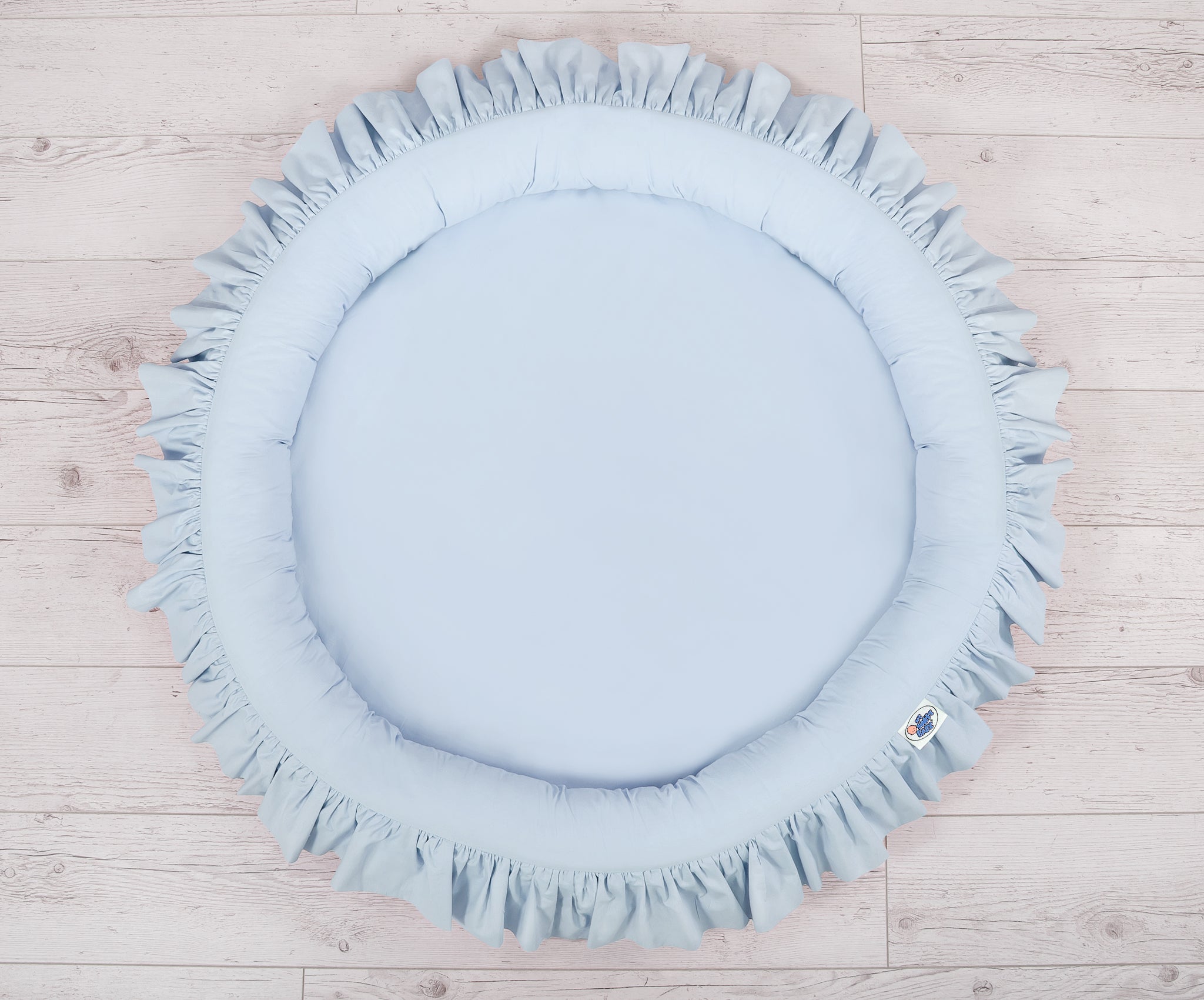 Nest with flounce - blue