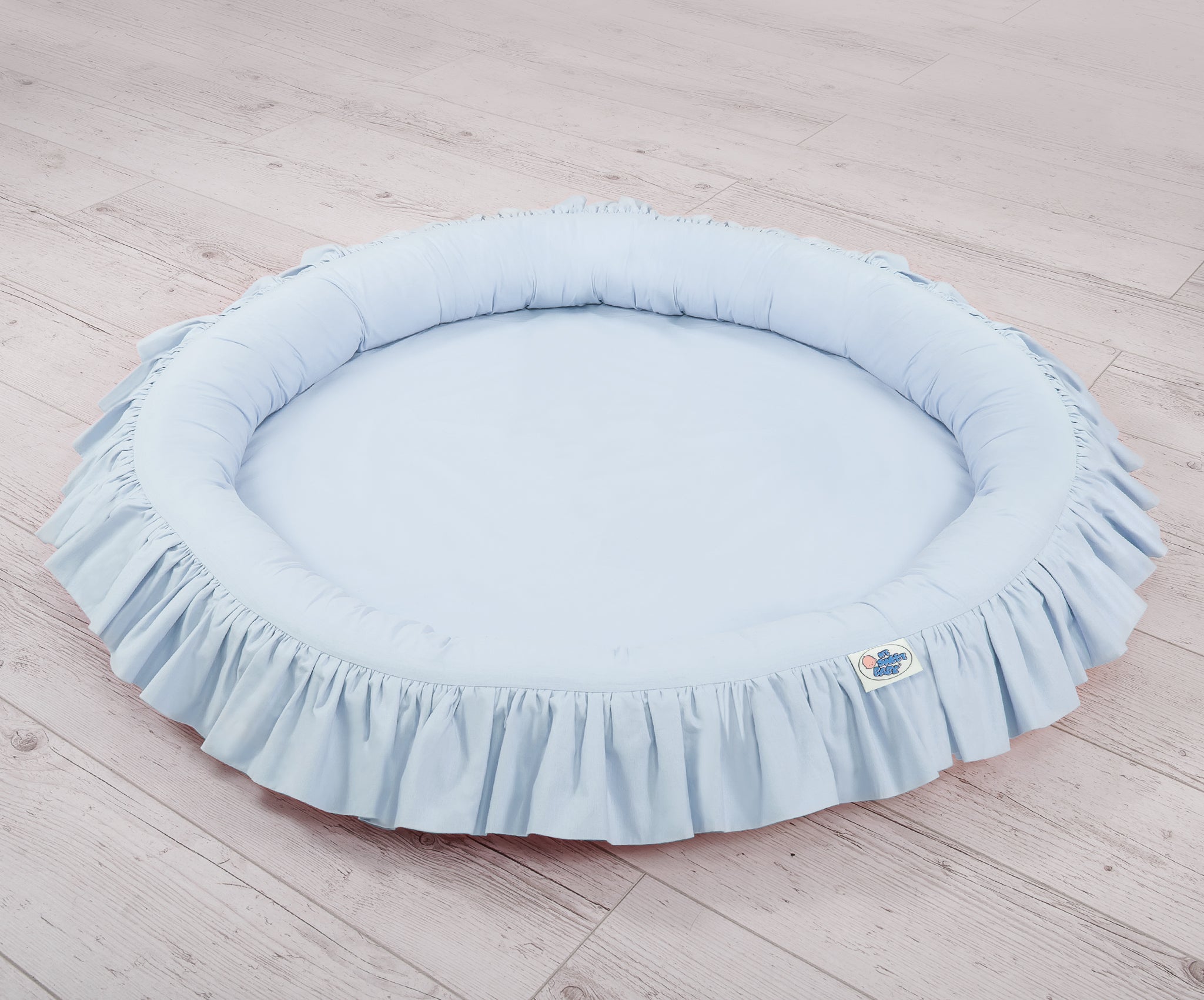 Nest with flounce - blue