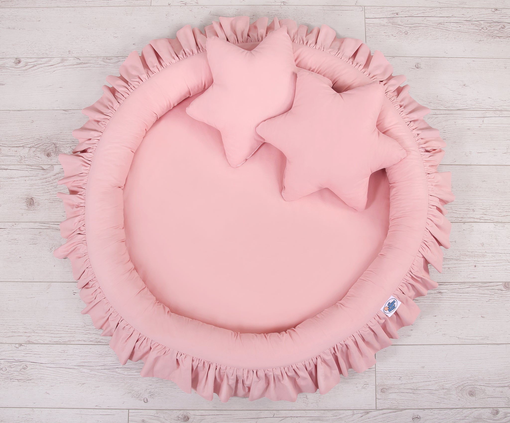 Nest with flounce - pastel pink
