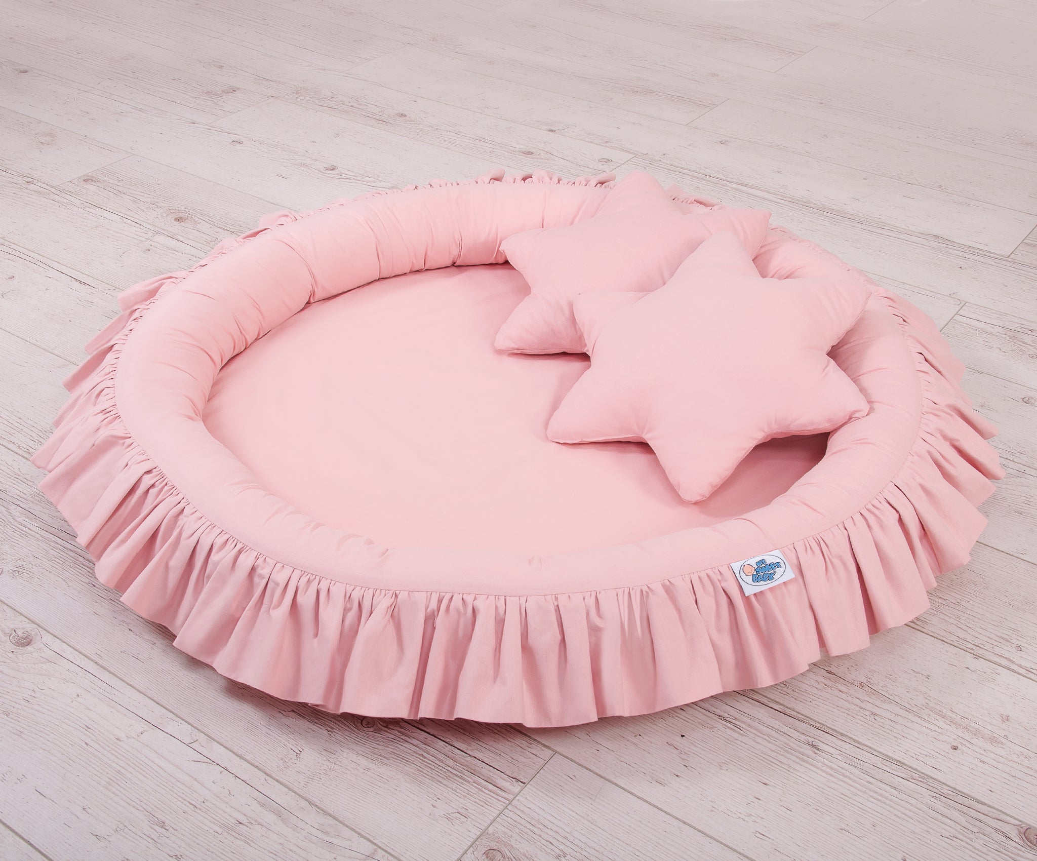 Nest with flounce - pastel pink