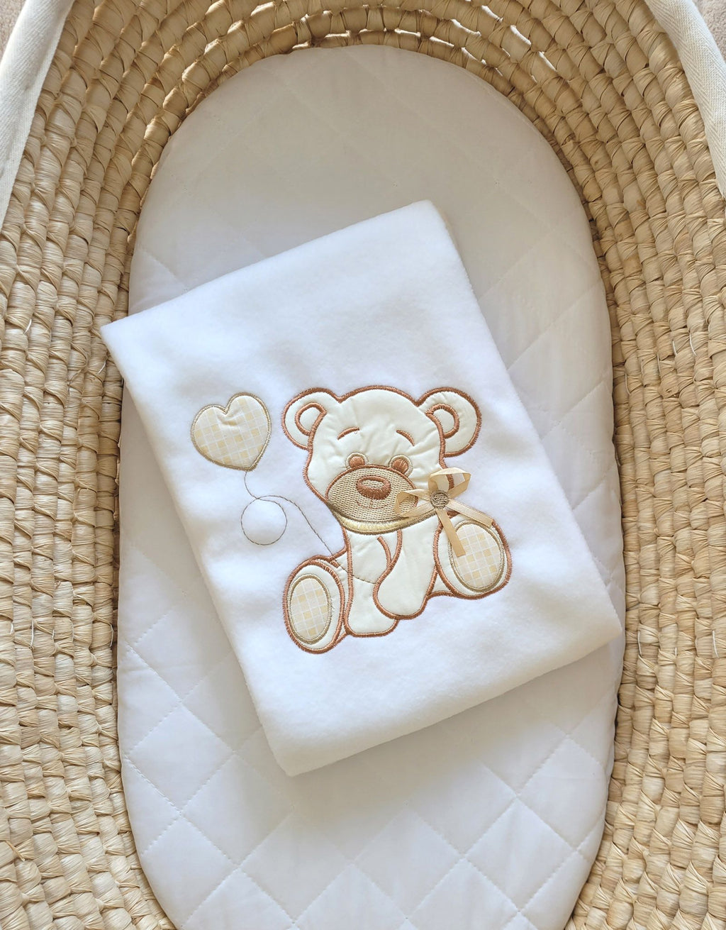 White polar fleece baby blanket with bear and bow
