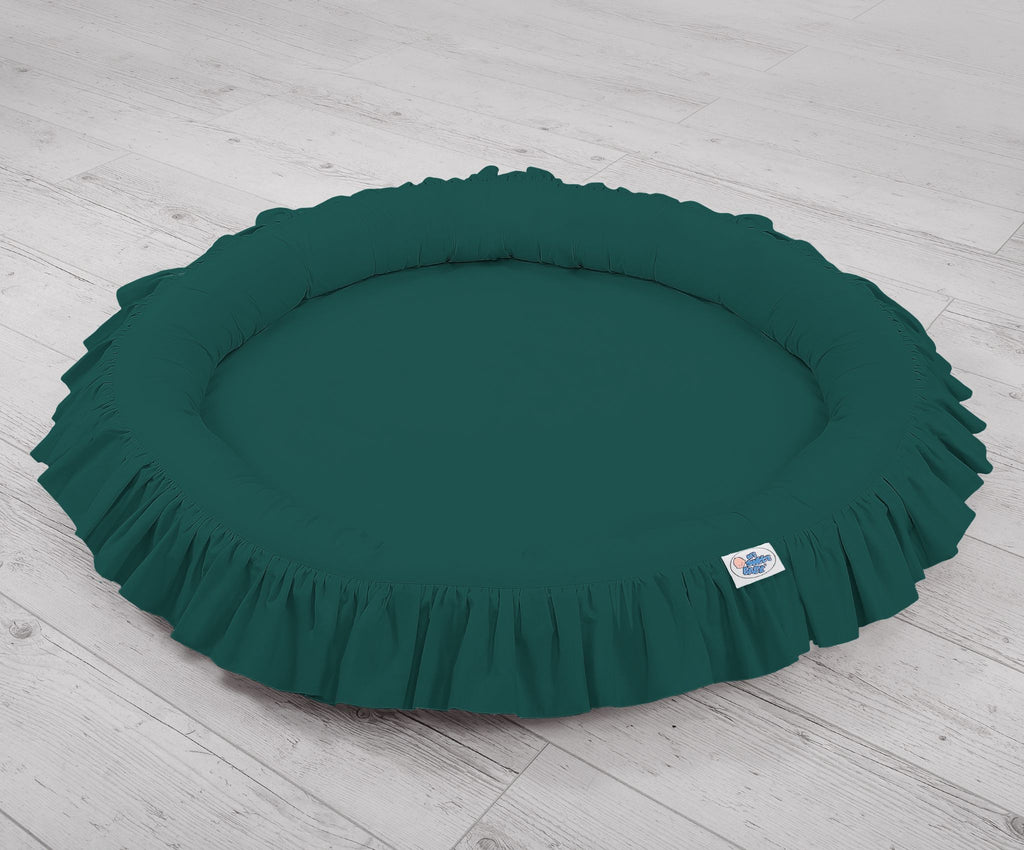Nest with flounce - bottle green