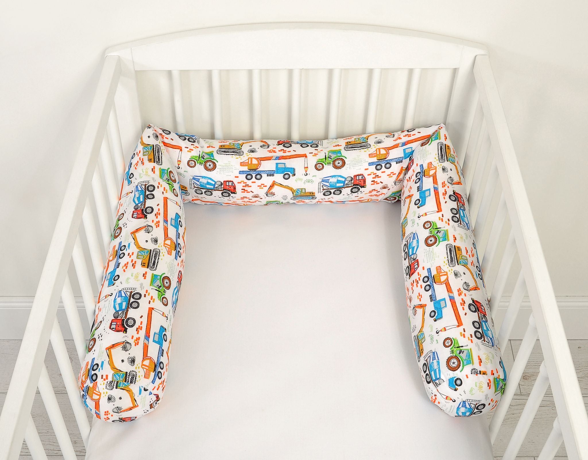 Roller bumper for baby bed - construction site